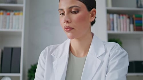 Physician Typing Medical Information at Laptop Data Base in Clinic Closeup