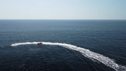 Banana Boat and Jet Ski on Blue Ocean