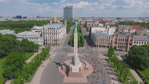 Riga Rimi Marathon 2024 Aerial View on Crowd of People Running Through the City During Marathon