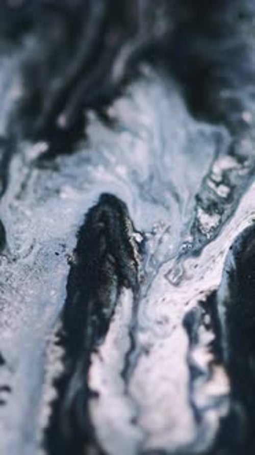Abstract Blue and White Paint Swirls
