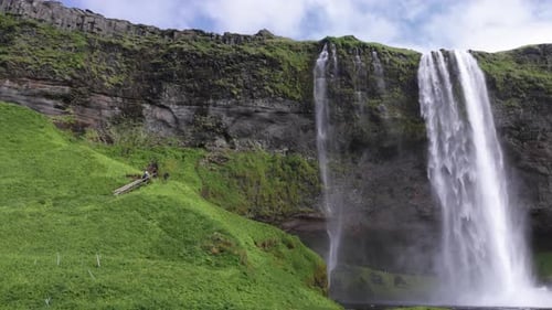 Seljalandsfoss Falls in Iceland with close up panning left to right.