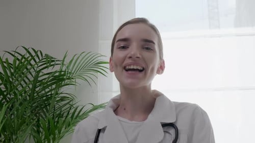 The Doctor Communicates Online with the Patient Using the Application Video