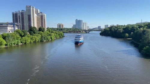 Aerial View Blue and White Big Passenger Ship Sailing Along the River at Sunny Summer Day Tourist
