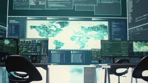 Empty Futuristic Office with Computer Screens Displaying Code