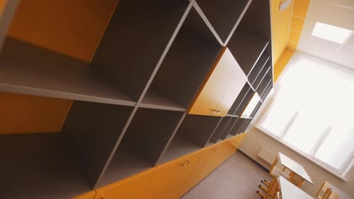 Empty Classroom with Bright Yellow Decor