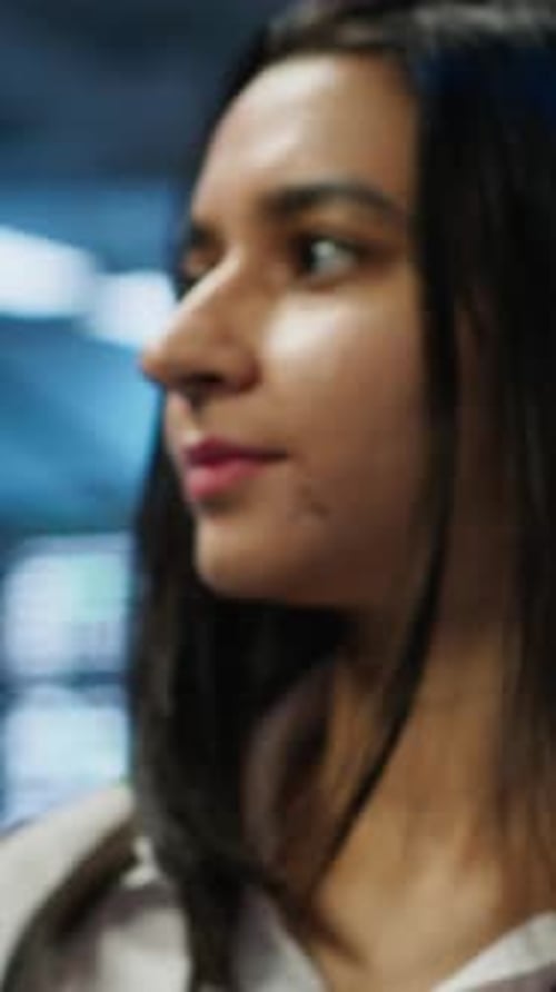 Young Woman Using Tablet in Modern Workplace