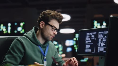 Thinking System Administrator Working Computer in Data Center Closeup IT Man