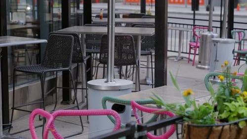 Empty cafe or restaurant early morning or on weekend. Closed or out of business. City street scene w