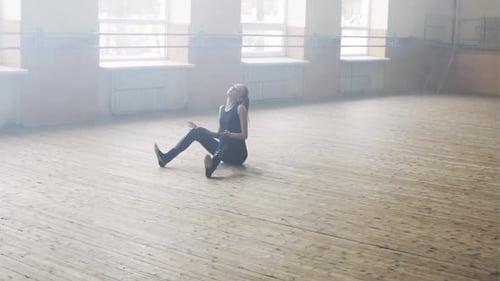 Graceful Dancer Practicing Ballet in Bright Studio