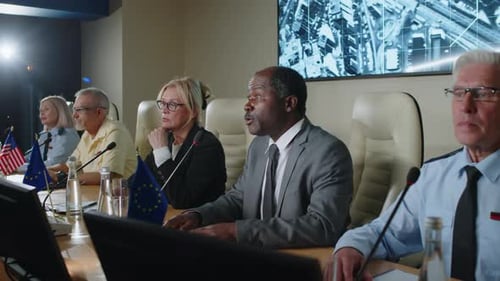 Adults Attending a Business Conference Meeting