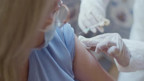 Adult Getting an Injection at the Doctor's Office