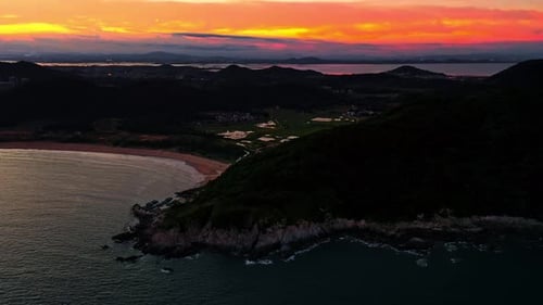 Aerial Top view of a transparent blue sea with beautiful waves at sunny day in summer. air of ocean