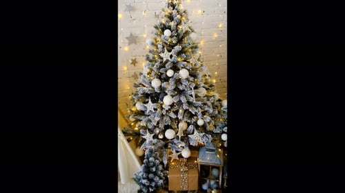 Decorated Christmas Tree with Gifts and Lights at Home