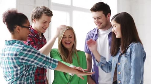 Education and School - Students Showing Unity with Their Hands Together All