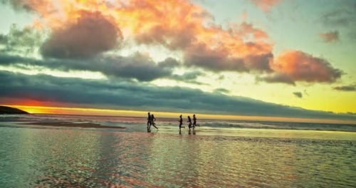 Running, friends and people on beach at sunset for holiday, vacation and weekend together