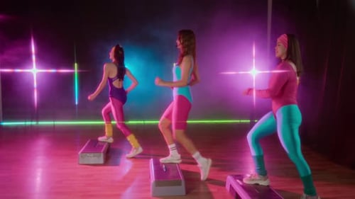 Retro Aerobics Class with Women Stepping on Platforms