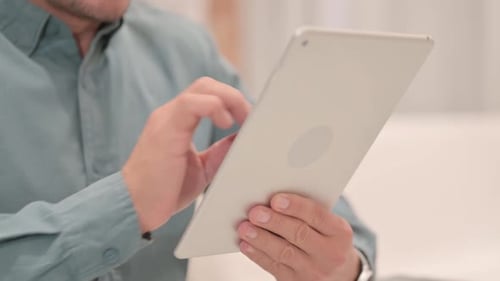 Close up of Man Hand Using Tablet PC