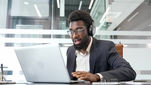 Excited Man Celebrating Success at Office Job