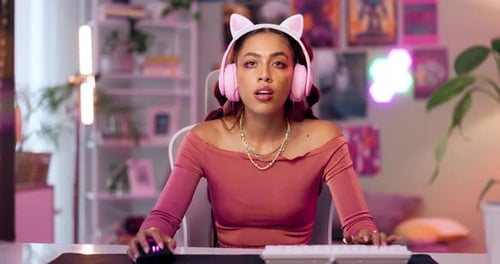 Young Adult Woman in Gaming Setup