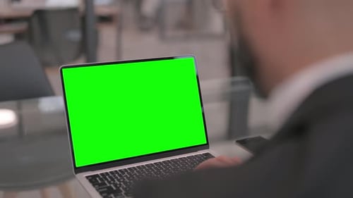 Working on Laptop with Green Screen Chroma Key