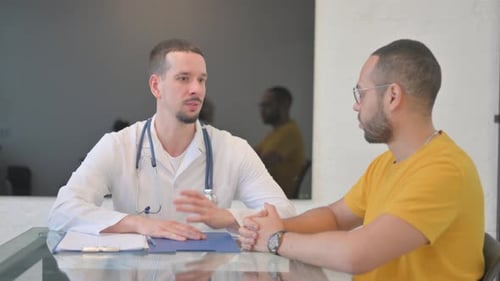 Doctor Consulting Patient in Modern Medical Office