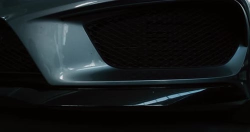 Close Up of Gray Luxury Car Front Grille