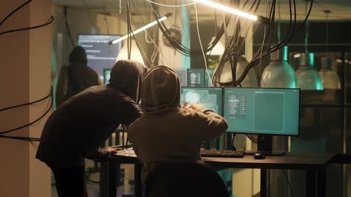 Data Breach: Coders Hacking in an Urban Office