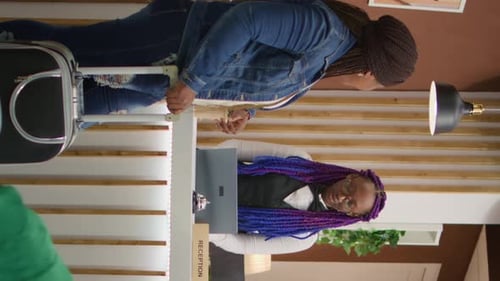 Vertical Video Hotel Concierge Welcoming Guests