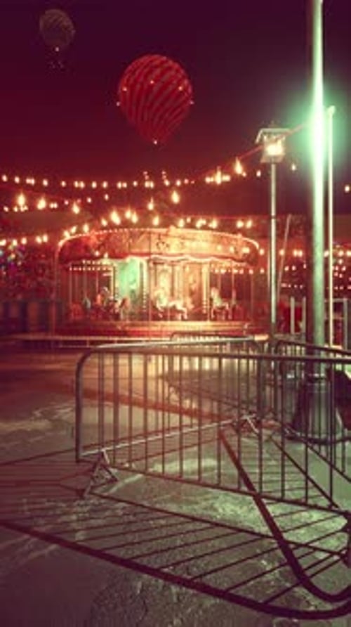 Brightly Lit MerryGoRound in Abandoned Amusement Park