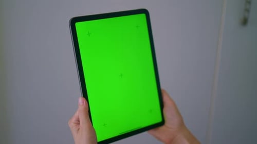 Hands Using Tablet with Green Screen Compositing