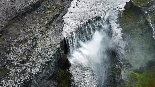 Waterfall in Canyon Mountain River in Summer Sunny Day Nature in Iceland Famous Tourist Attraction