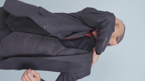 Adult Man Experiencing Neck and Shoulder Pain