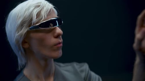 Millennial man experiencing metaverse innovation data analysis with vr goggles