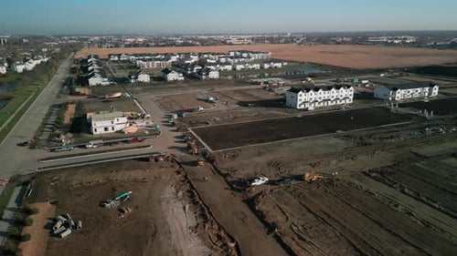 Aerial View of Suburban Construction and Housing Development