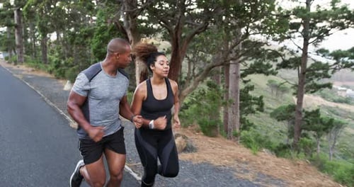 Athletic Couple Jogging Outdoors