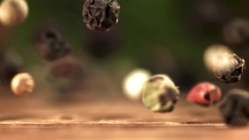 Peppercorns Falling in Slow Motion Close Up