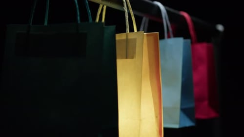 Shopping Bags Hanging on Rack