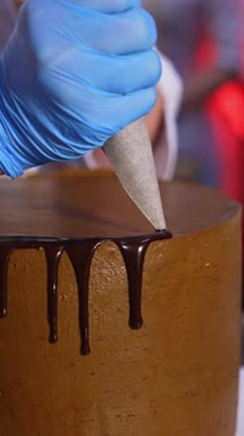 Drizzling Chocolate Icing on Cake