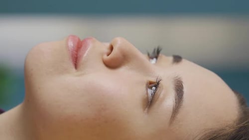 Beautiful Woman Looking Upward in Close Up
