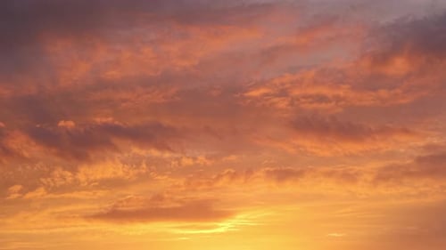 Vibrant Orange Clouds at Sunset