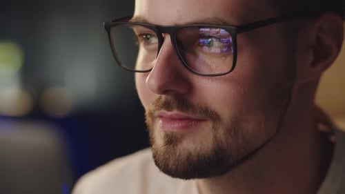 Close Up of a Man with Glasses Indoors