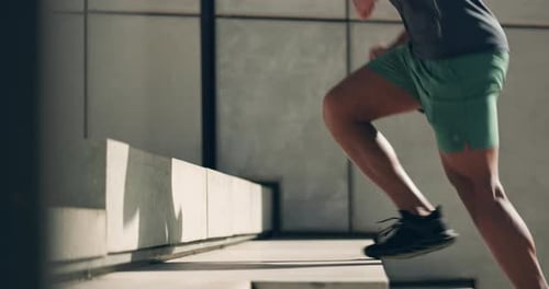 Person, training and fitness for wellness on stairs for marathon, sports or workout with shoes