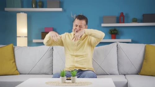 Happy man dancing to the camera.