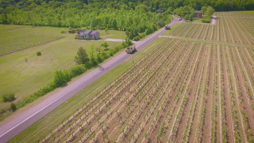 Construction crew paving a small country road on a hot summer day