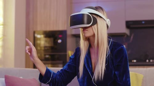 Woman Experiences Virtual Reality in Modern Home