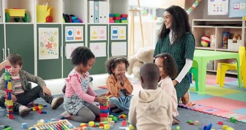 Teacher, kids and play with blocks in class for learning, problem solving and creative activity