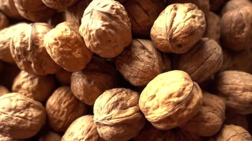 Pile of Golden-Brown Walnuts Up Close