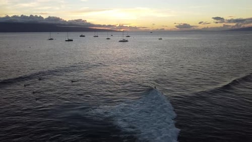 Beautifull sunset at a surfing beach in Hawaii