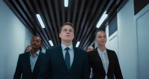 Multiethnic Business Team of Confident Businesspeople Walking in Corridor of Office Center Prores