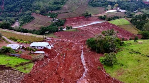 Homes washed away, mudslide danger, communities calamitous impact, aerial